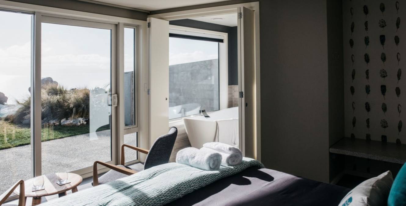 All rooms have a private courtyard and the same lake and mountain views