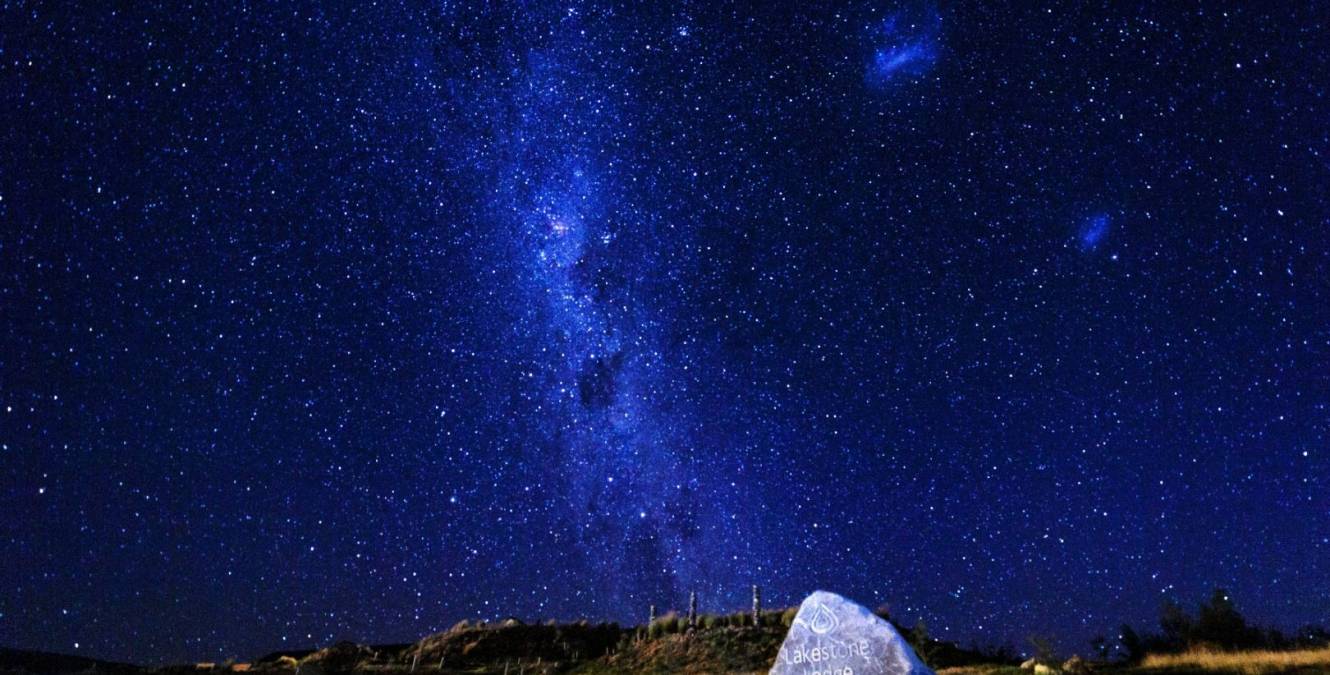 Milky Way and star-filled night sky in the Aoraki Mackenzie International Dark Sky Reserve above Lakestone Lodge, Lake Pukaki.