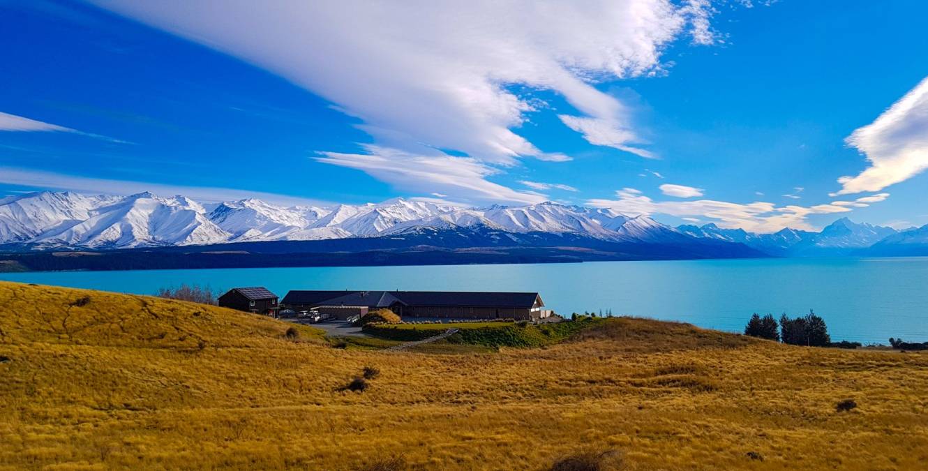 Snow-capped peaks of the Southern Alps and the glacial waters of Lake Pukaki in winter